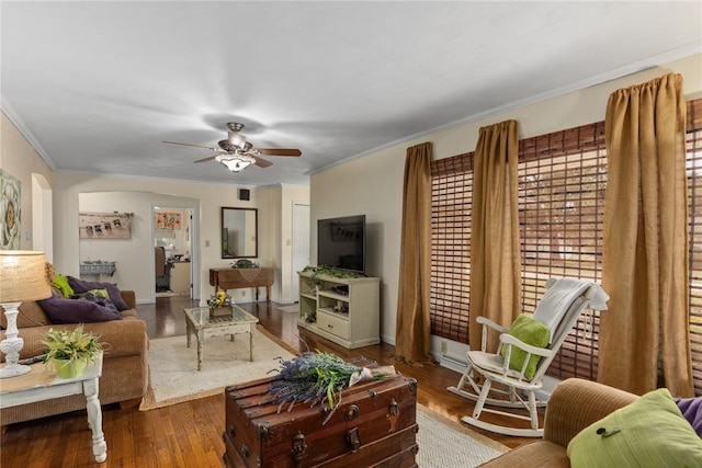 101 Willow Dr, Farina, IL 62838 - living room with ceiling fan, wood finished floors, crown molding, and arched walkways