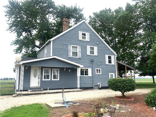 647 E 2100 N Rd, Assumption, IL 62510 - back of property with a chimney