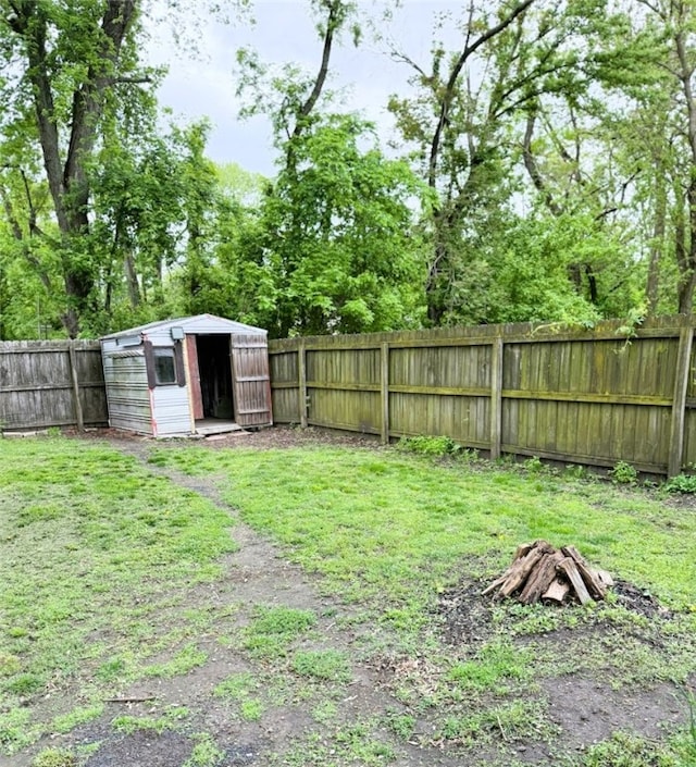 709 10th St, Charleston, IL 61920 - view of yard featuring a shed and an outbuilding