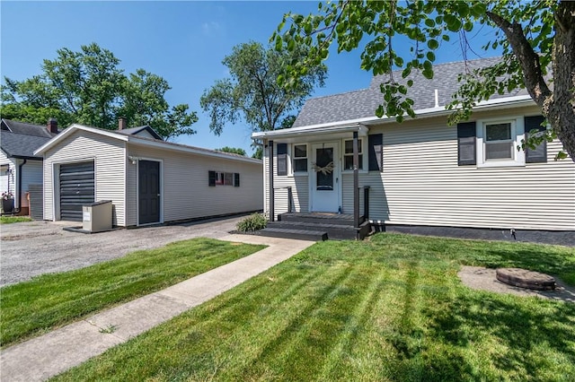 503 W Harrison St, Sullivan, IL 61951 - view of front of house with a front yard and a garage