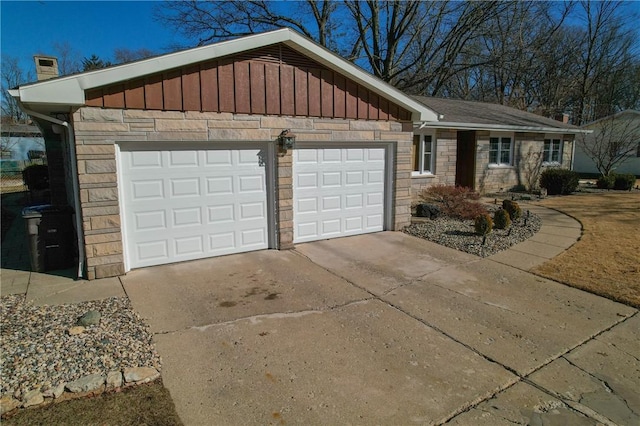 single story home featuring driveway, stone siding, a chimney, an attached garage, and board and batten siding