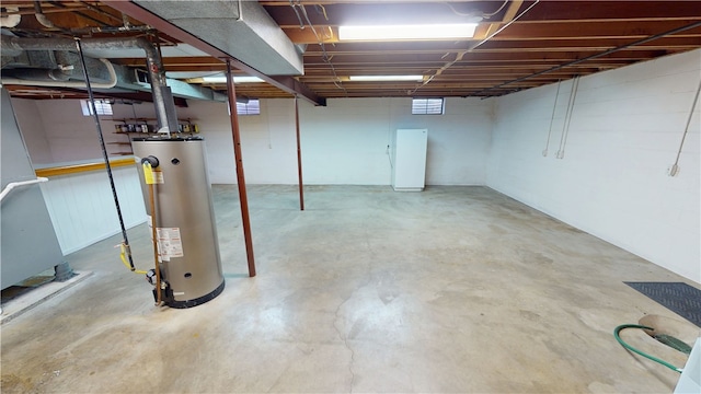 basement featuring water heater