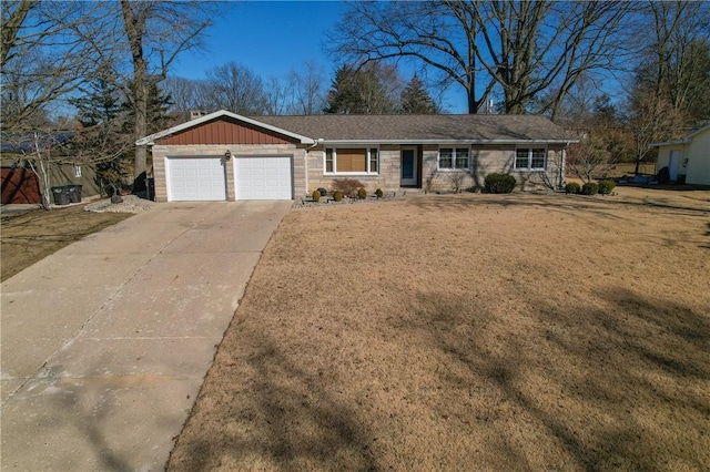 ranch-style home with board and batten siding, stone siding, concrete driveway, and a garage