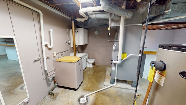 utility room featuring a sink and gas water heater