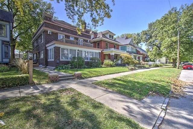 view of front of house with a front lawn