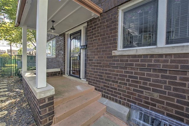 property entrance featuring covered porch