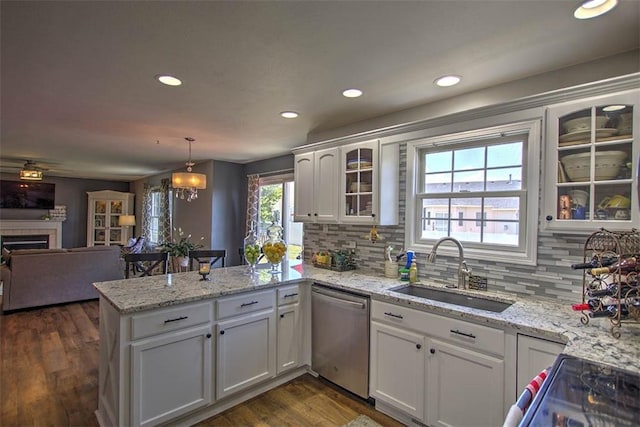 737 Phillip Cir, Forsyth, IL 62535 - kitchen featuring dishwasher, a peninsula, white cabinetry, recessed lighting, and backsplash