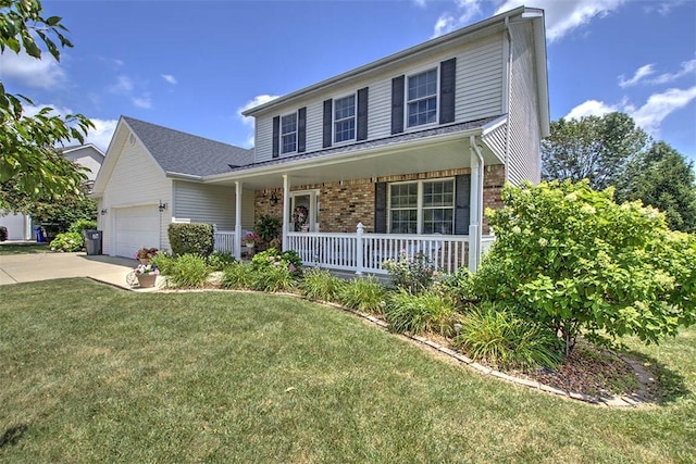 737 Phillip Cir, Forsyth, IL 62535 - traditional-style home with covered porch, a front yard, brick siding, concrete driveway, and a garage