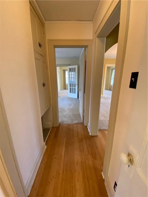 corridor featuring light wood-type flooring