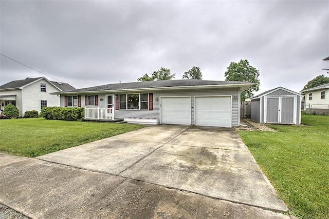335 E Walnut St, Dalton City, IL 61925 - view of front of home featuring a garage, a front yard, and driveway