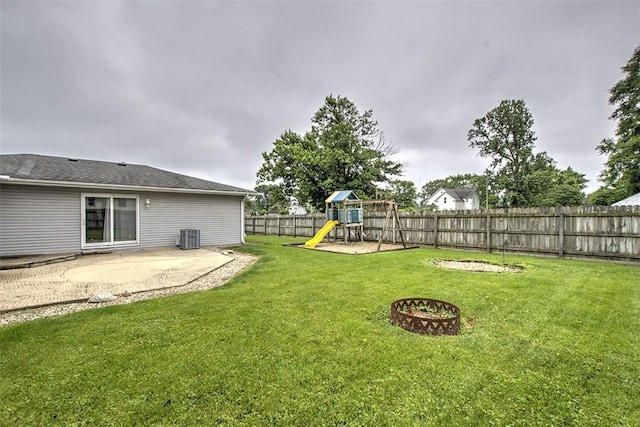 335 E Walnut St, Dalton City, IL 61925 - view of yard with a patio area, a playground, and cooling unit