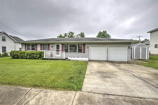 335 E Walnut St, Dalton City, IL 61925 - ranch-style home with an attached garage, driveway, and a front lawn