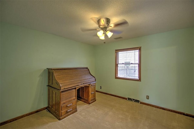 335 E Walnut St, Dalton City, IL 61925 - unfurnished office with a ceiling fan, light carpet, baseboards, and a textured ceiling