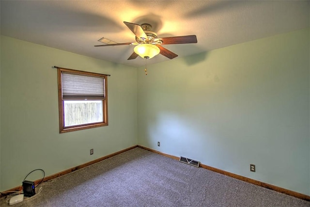 335 E Walnut St, Dalton City, IL 61925 - spare room with carpet, a ceiling fan, and baseboards