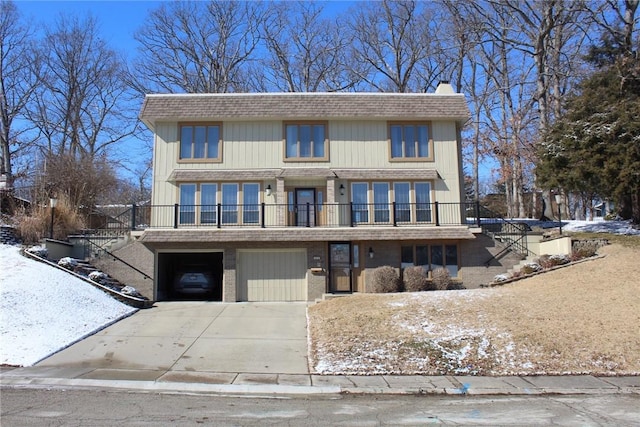 view of front of property with a garage and french doors