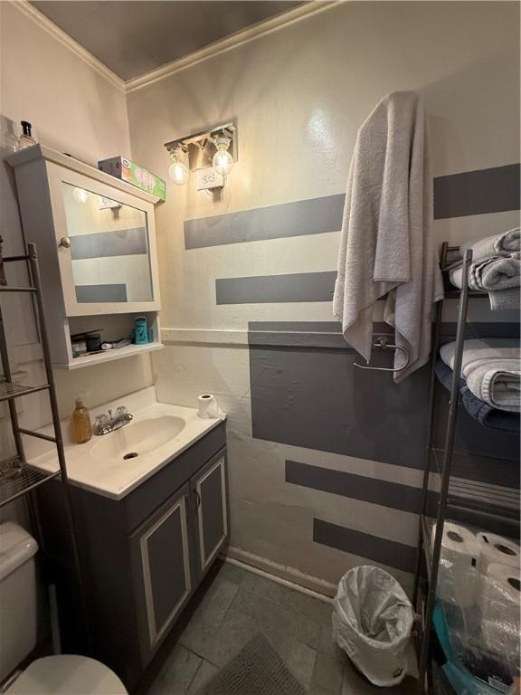 124 Polk Ave, Charleston, IL 61920 - half bath with vanity and crown molding