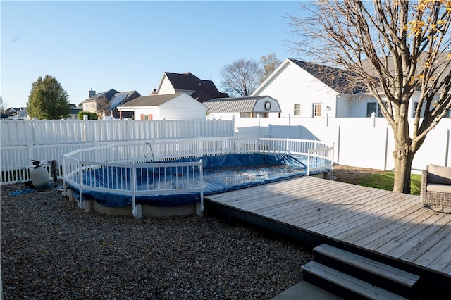 view of pool featuring a wooden deck