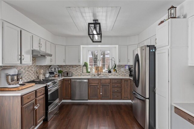 dining area featuring dark hardwood / wood-style floors and ceiling fan