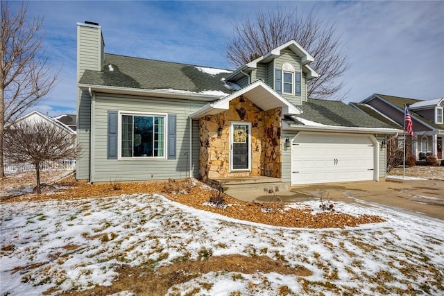 view of front of property with a garage