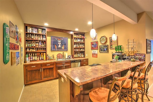 bar featuring built in shelves, stainless steel dishwasher, and decorative light fixtures