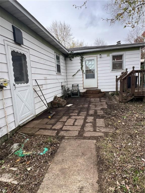 705 Orlando Dr, Robinson, IL 62454 - rear view of house featuring entry steps and a patio