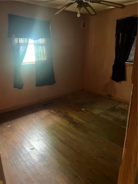 705 Orlando Dr, Robinson, IL 62454 - empty room with hardwood / wood-style floors and a ceiling fan
