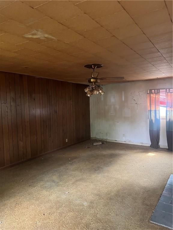 705 Orlando Dr, Robinson, IL 62454 - unfurnished room with wood walls