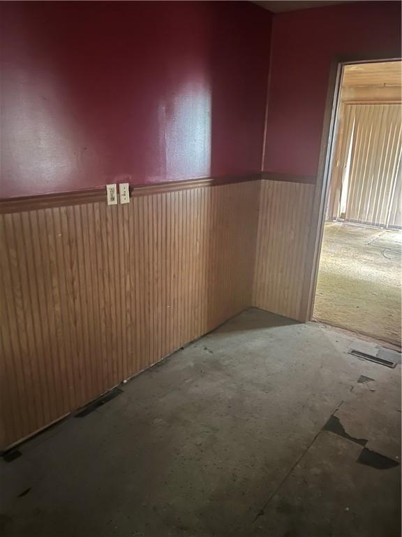 705 Orlando Dr, Robinson, IL 62454 - spare room with a wainscoted wall
