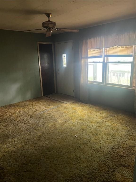 705 Orlando Dr, Robinson, IL 62454 - empty room featuring carpet floors and ceiling fan