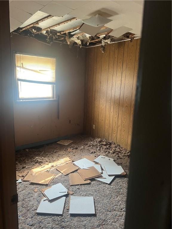 705 Orlando Dr, Robinson, IL 62454 - spare room with wood walls