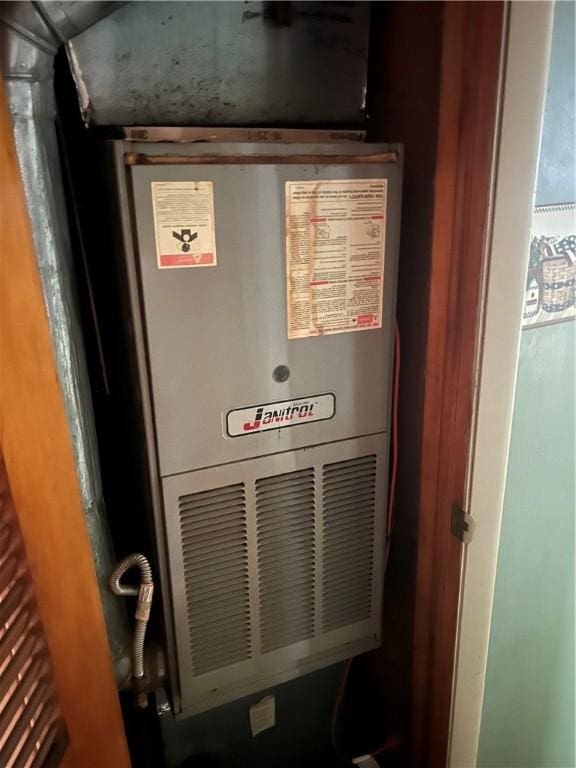705 Orlando Dr, Robinson, IL 62454 - utility room with heating unit