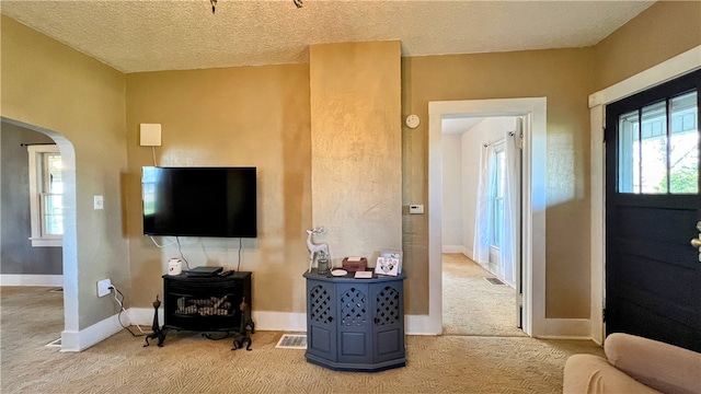 interior space with a textured ceiling