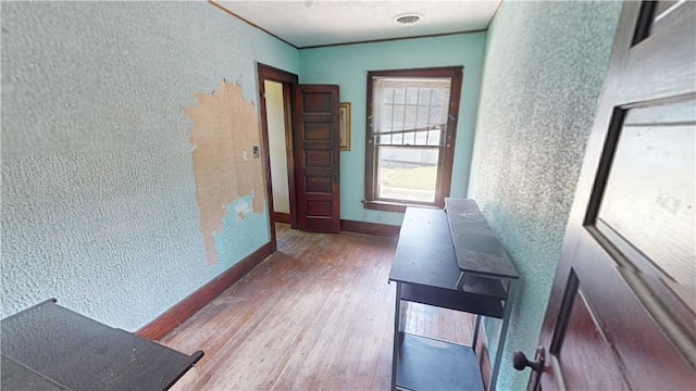 616 Griffin St, Danville, IL 61832 - hallway featuring a textured wall and wood finished floors