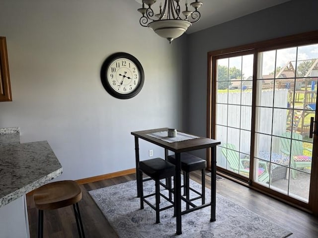 34A Woolery Dr, Neoga, IL 62447 - dining area with a chandelier and wood finished floors
