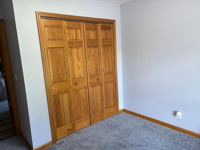 34A Woolery Dr, Neoga, IL 62447 - carpeted bedroom with baseboards and a closet