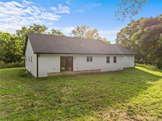 25760 E 1750th Rd, Marshall, IL 62441 - rear view of property with french doors, a yard, and a shingled roof