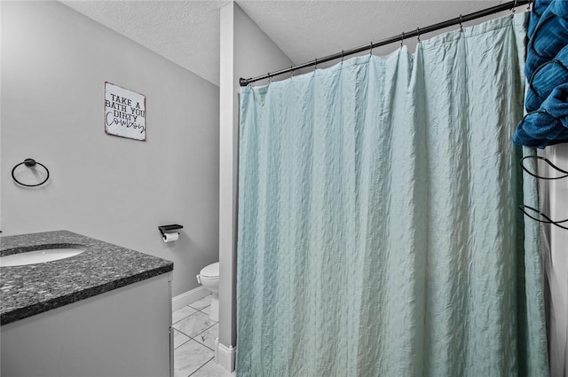 25760 E 1750th Rd, Marshall, IL 62441 - bathroom featuring a textured ceiling, vanity, marble look tile flooring, and a shower with shower curtain