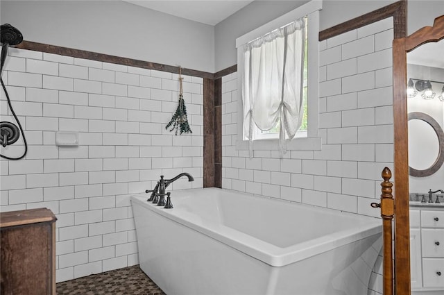 25760 E 1750th Rd, Marshall, IL 62441 - bathroom with tile walls, a bathtub, and vanity