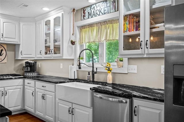 25760 E 1750th Rd, Marshall, IL 62441 - kitchen featuring stainless steel appliances, white cabinetry, glass insert cabinets, and recessed lighting