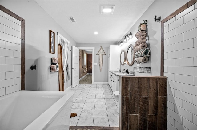 25760 E 1750th Rd, Marshall, IL 62441 - full bath featuring marble look tile flooring, vanity, a bath, and recessed lighting