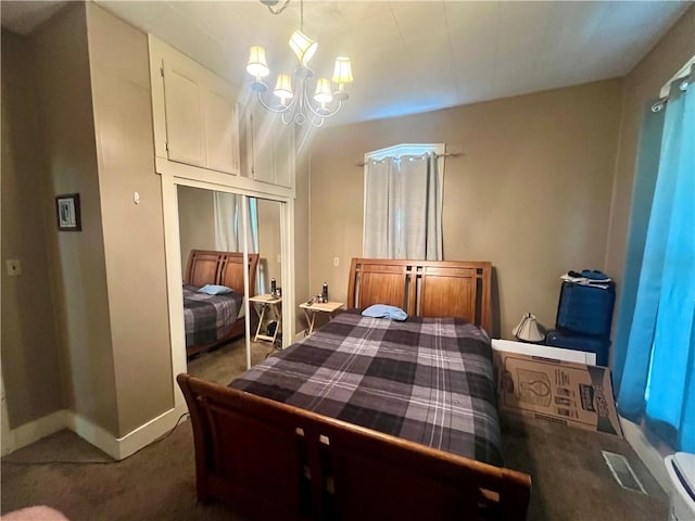 720 Prairie Ave, Mattoon, IL 61938 - carpeted bedroom with a chandelier and a closet