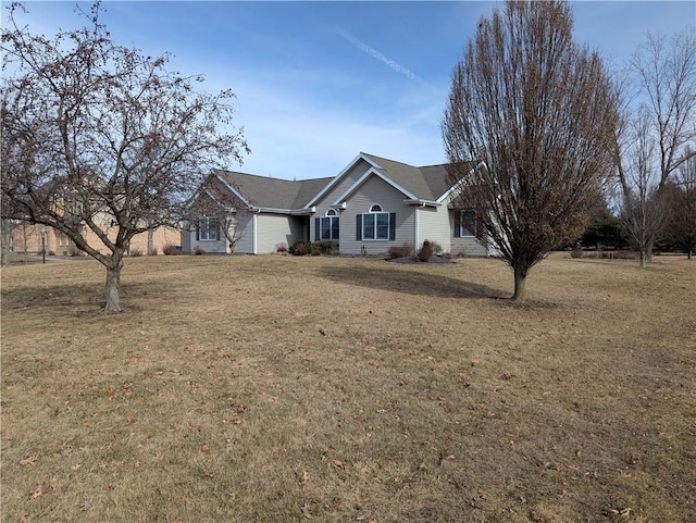 ranch-style house with a front yard