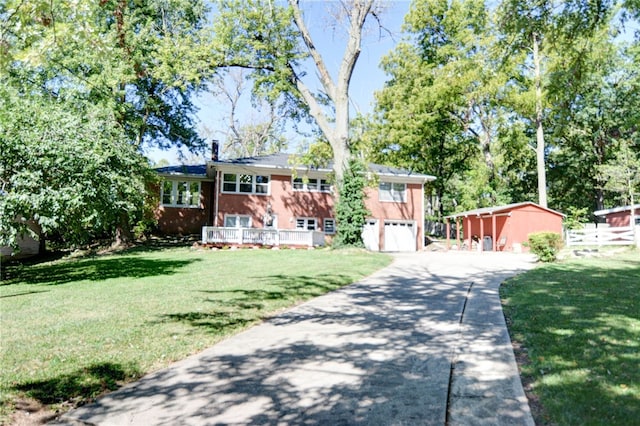 view of front facade featuring a garage and a front lawn