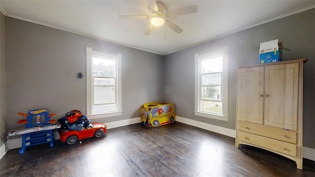437 Powers Ln, Decatur, IL 62522 - recreation room featuring wood finished floors, healthy amount of natural light, crown molding, and a ceiling fan