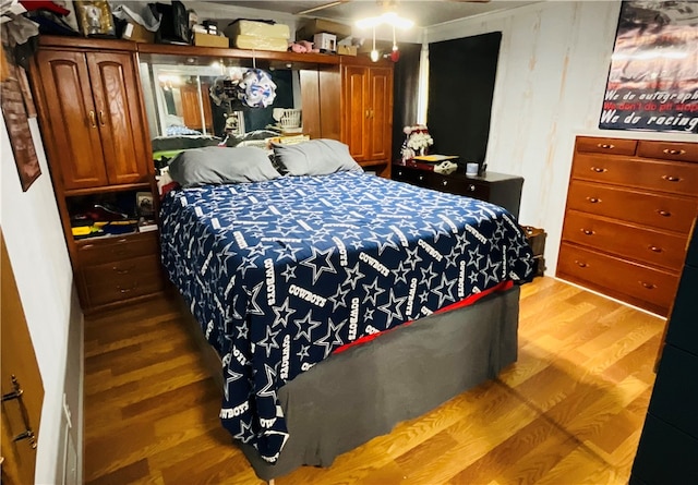 bedroom featuring hardwood / wood-style flooring