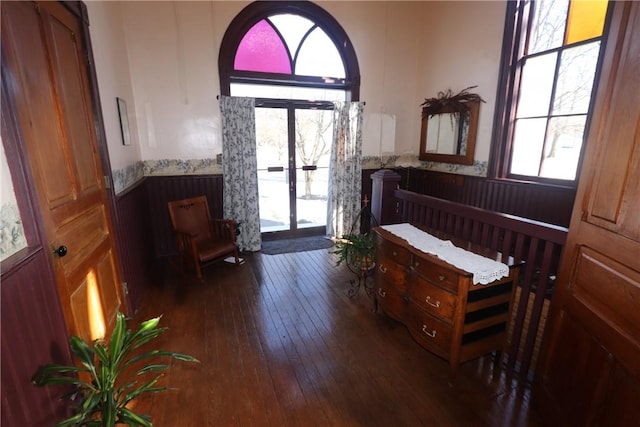 interior space featuring french doors and dark hardwood / wood-style floors