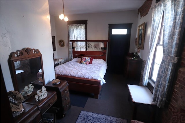 bedroom featuring multiple windows