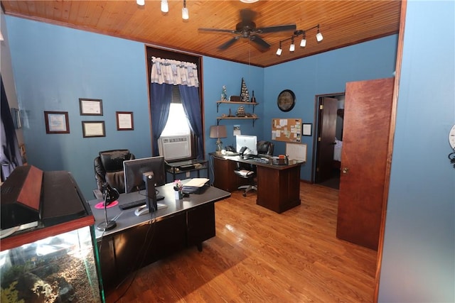 office space featuring ceiling fan, crown molding, wooden ceiling, and light wood-type flooring