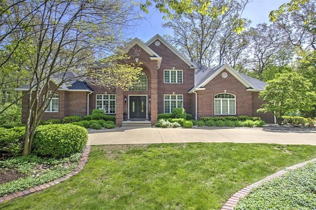 4140 S Lake Ct, Decatur, IL 62521 - view of front of house with a front lawn, french doors, and brick siding