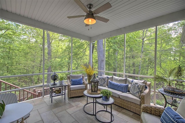 4140 S Lake Ct, Decatur, IL 62521 - sunroom / solarium featuring an outdoor hangout area, a wooded view, and a ceiling fan